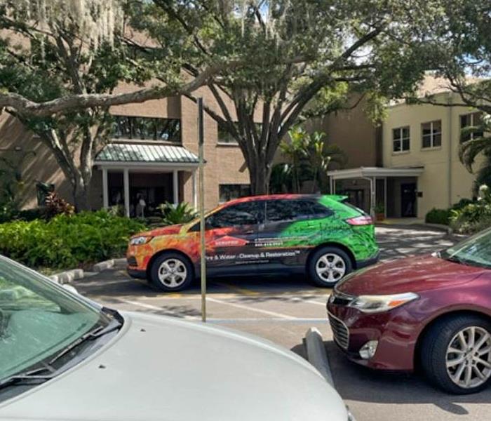 SERVPRO car parked outside of a home.